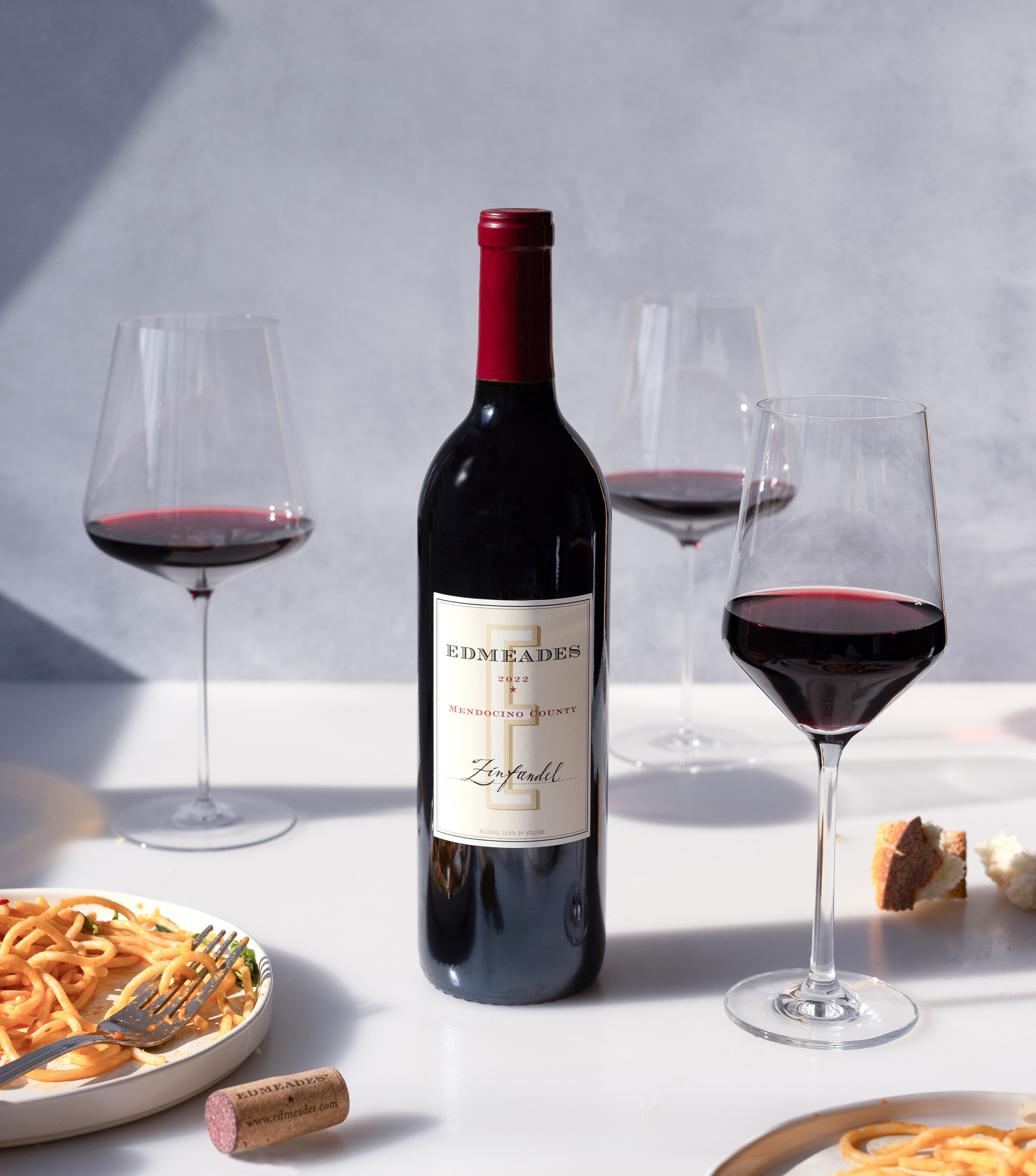 Edmeades Mendocino Zinfandel with glasses of wine and a pasta dish. Copy reads Edmeades Distinctly Mendocino. Edmeades Mendocino Zinfandel with glasses of wine and a pasta dish. Copy reads Edmeades Distinctly Mendocino.